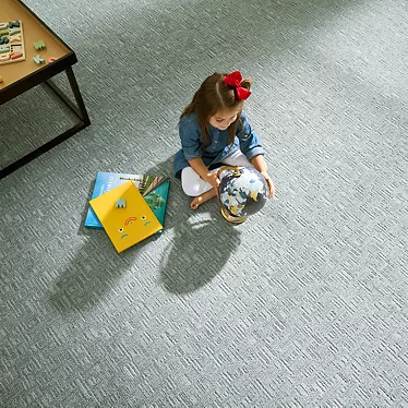 Child playing on a Mohawk carpet floor